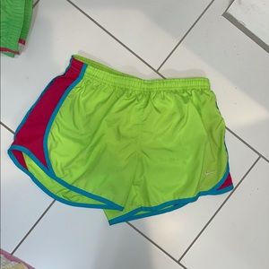 Nike DRI-FIT shorts & pink, green, and blue